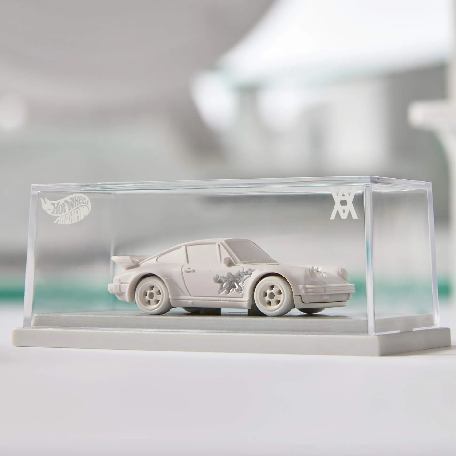 Hot Wheels x Daniel Arsham Eroded Porsche 930 and Rally Case
